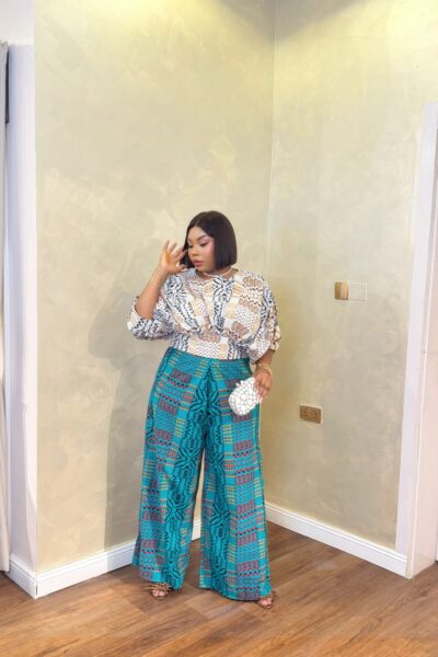 Elegant Ankara Pant Set for Women featuring vibrant wide-leg African print trousers and a stylish patterned top.