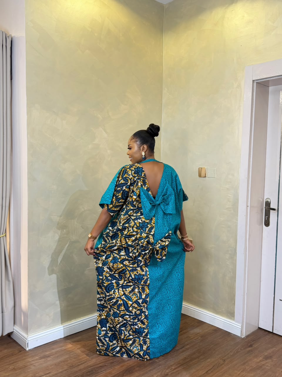 Elegant teal and Ankara print long Bubu dress with statement bow back