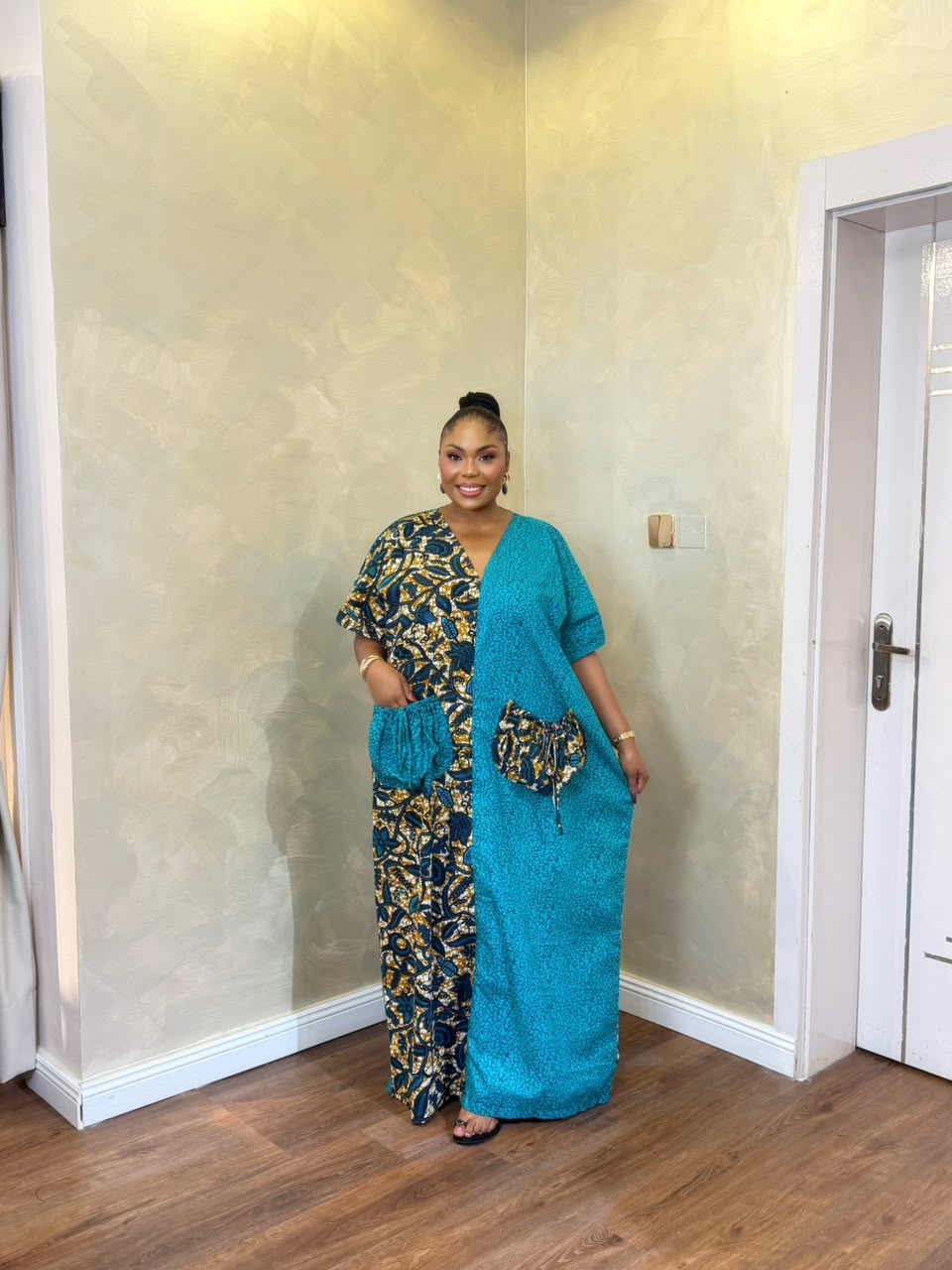 Elegant teal and Ankara print long Bubu dress with statement bow back